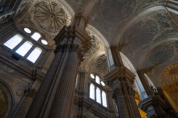 Obraz premium Interior view of a grand cathedral in Malaga.. Cathedral of Malaga, Spain
