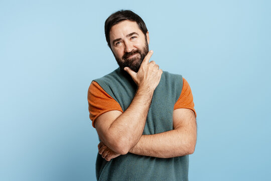 Man making a decision and thinking, forming new ideas with crossed arms