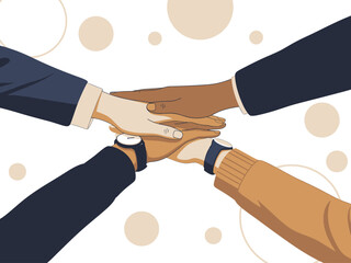 Four diverse people stacking hands in a symbol of teamwork and unity