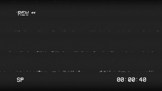 Rew VHS tape with distorted signal glitch overlay on black background. 4k Video
