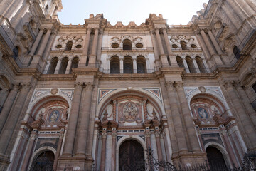 Fototapeta premium Facade of a grand cathedral in Malaga, Spain.. Cathedral of Malaga, Spain