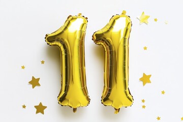 Golden number 11 balloons with stars on white background for celebrations and anniversaries