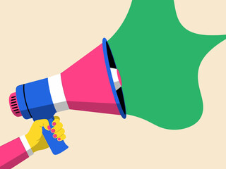 Colorful megaphone with hand on beige and