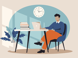 A man sitting at a desk with a laptop and books in a modern office setting