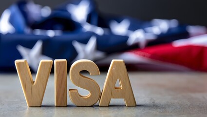Wooden letters spelling visa with a blurred american flag background for immigration concept