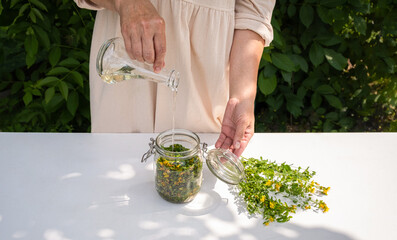 St. John's Wort Oil Recipe Step 10: Final Oil Pour into Filled Jar