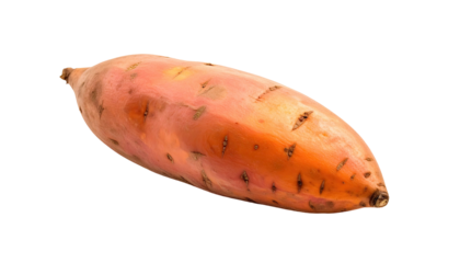 Close-up of a vibrant orange-hued, oblong root vegetable on a solid black background