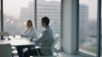 Blurred office meeting with diverse team in modern conference room - Powered by Adobe