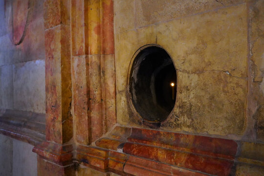 Hole in the Aedicule through which the Holy Fire is supplied outside.Jerusalem,Israel.