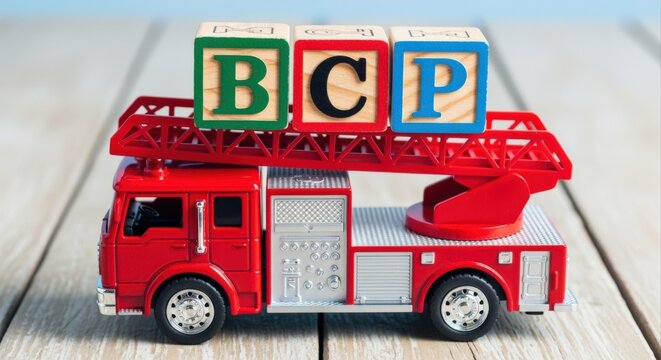 Toy Firetruck with Alphabet Blocks Spelling BCP: Concept for Business Continuity Plan, Emergency Planning