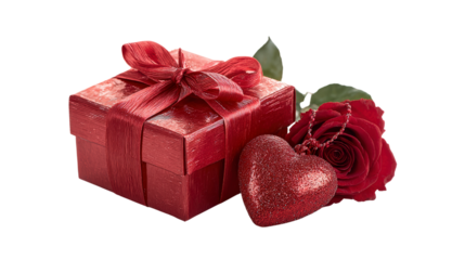 Festive square red gift box with silky ribbon bow alongside heart and rose flower representing love joy affection surprise passion on transparent background