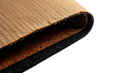 Close-up of layered material with visible textures and a slight curved edge