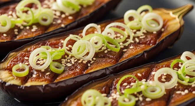 Delicious Japanese Nasu Dengaku Eggplant Dish with Scallions and Sesame Seeds.