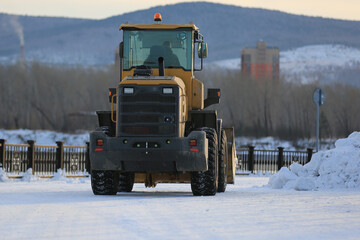 mechanized snow removal from the streets