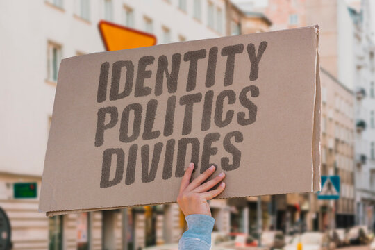"Identity Politics Divides" Group-based claims fragment broader unity. GROUPBASED. CLAIMS. FRAGMENT. BROADER. UNITY.