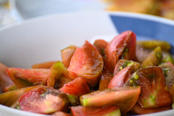 Chopped tomatoes salad with olive oil. The Concept of Healthy Diet.