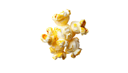 Close-up studio shot of buttery popcorn kernels floating against a deep black background