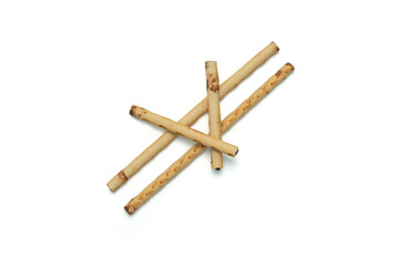 Biscuit wafer stick or Wafer rolls with chocolate on isolated white background. Top view.