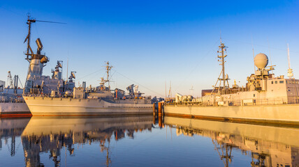 Fototapeta premium Late afternoon sunlight on the battleships of the marine museum in Wilhelmshaven, Germany