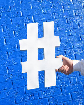 Social Media Trend Hashtag Symbol in Hand
