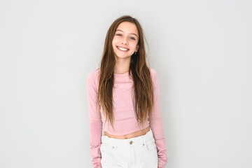 cute and Young pre teen girl on studio white