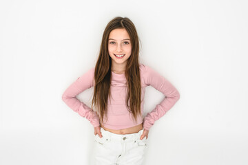 cute and Young pre teen girl on studio white
