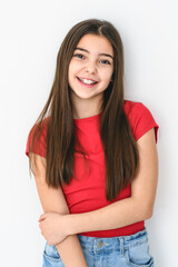 cute and Young pre teen girl on studio white