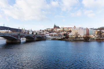 Fototapeta premium Snowy Prague Lesser Town with gothic Castle, Czech Republic 