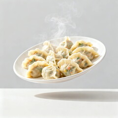 Steaming delicious dumplings presented on a white plate
