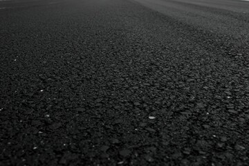 Smooth Black Asphalt Road Surface Close-up