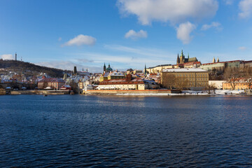 Obraz premium Snowy Prague Lesser Town with gothic Castle, Czech Republic 