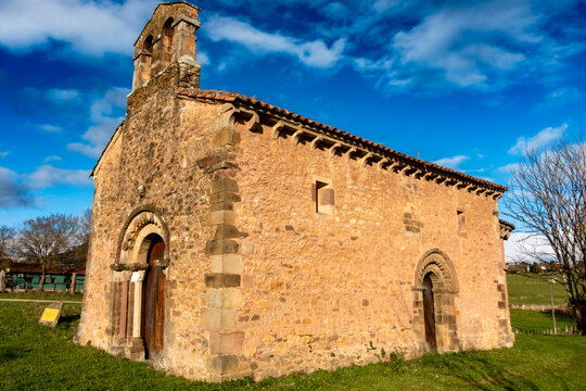 Romanesque rural church of San Esteban de Aramil with stone bell gable from the 12th century, Asturias, Spain