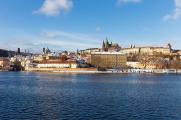Fototapeta premium Snowy Prague Lesser Town with gothic Castle, Czech Republic 