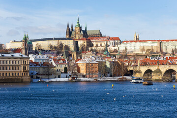 Obraz premium Snowy Prague Lesser Town with gothic Castle, Czech Republic 