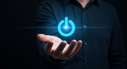 Power On Holding Glowing Power Button Symbol in His Hand Technology
