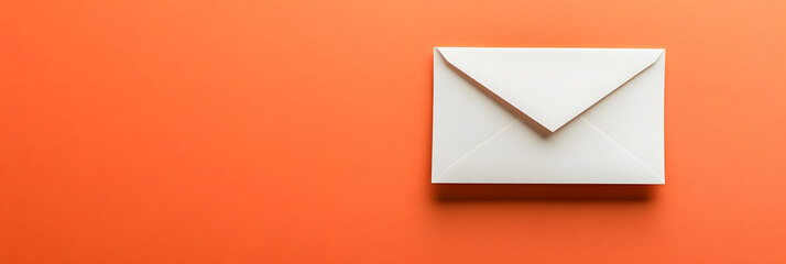White Envelope on Bold Orange Background