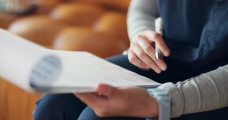 Hands, writing and documents on sofa for finance, checklist and signature for tax compliance in home. Person, clipboard and paperwork with contract, investment or insurance policy on couch at house