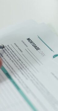 Real estate, contract or hands in office with reading, title deed or info documents for mortgage loan. Closeup, legal or person at desk with paper, property investment or review of realtor deal.