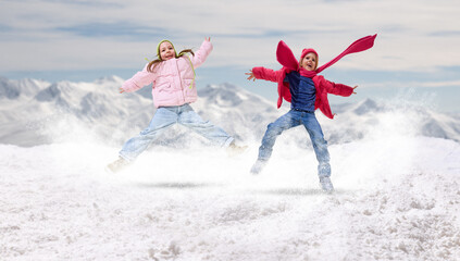Joyful poster with two children jumping together in snow. Concept of pure winter happiness, playful...