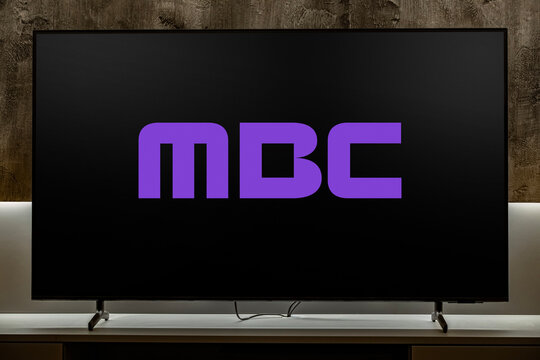 Flat-screen TV set displaying logo of MBC