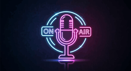 Neon on air sign with microphone in circle glowing bright pink and blue on dark background for live broadcast or podcast with radio and music