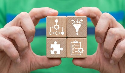 Business person holding wooden blocks with icons symbolizing the sorting and filtering. Concept of data sorting and filtering. Sort Filter Business Finance