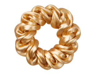 A single golden silk scrunchie for hair styling on a clean white background.