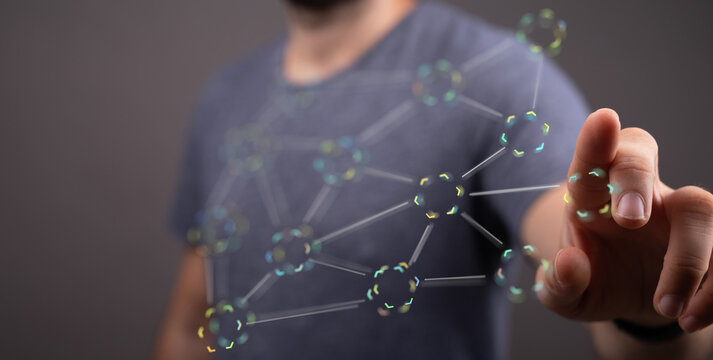 Man touching futuristic network representing connectivity, global communication, and technological innovation. - Powered by Adobe