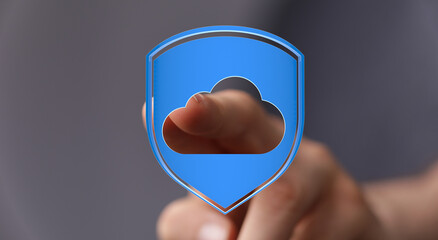 Hand pointing towards cloud protection shield. Digital security and cloud computing concept. Data protection sy