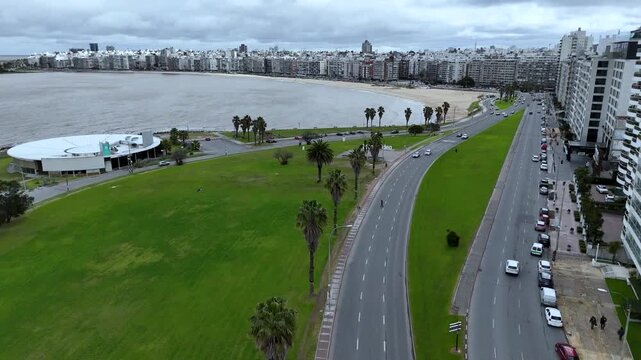 Iconic Montevideo city sign on the Rambla. Panoramic view of the beach and Rio de la Plata coastline in Uruguay.