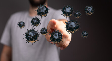 A man's hand pointing towards 3D-rendered viruses, symbolizing disease, danger, and the spread of...