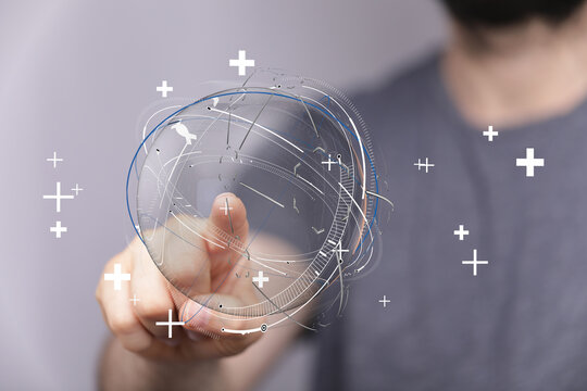 Close-up of a hand touching a digital globe, symbolizing global networks, connection, and data visualization in a modern business context. - Powered by Adobe