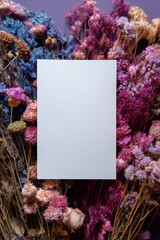 Vertical Blank White Card Mockup on Colorful Dried Flowers