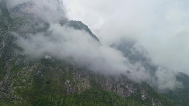 Cloud-covered alpine peaks in the Dolomites, Italy